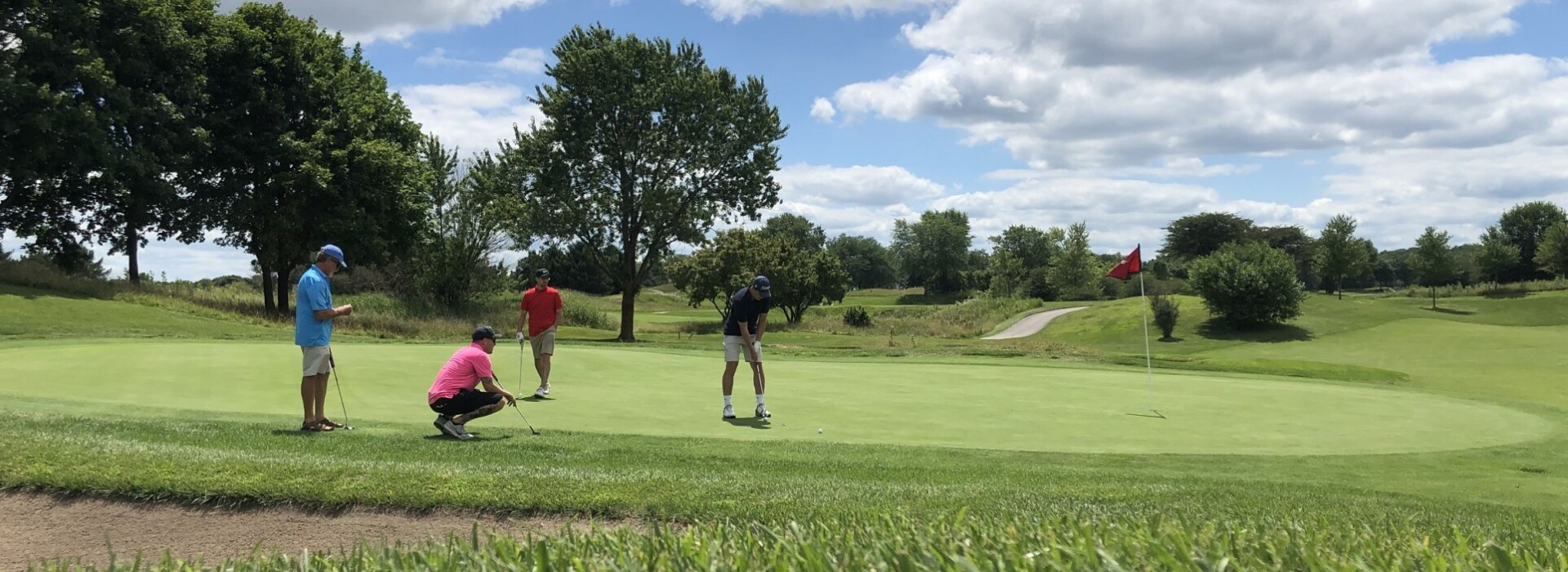 Golfers assessing on golf course